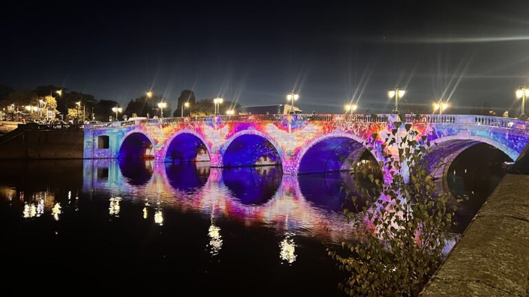 Worcester’s bridge over the River Severn lit with projection mapping at night