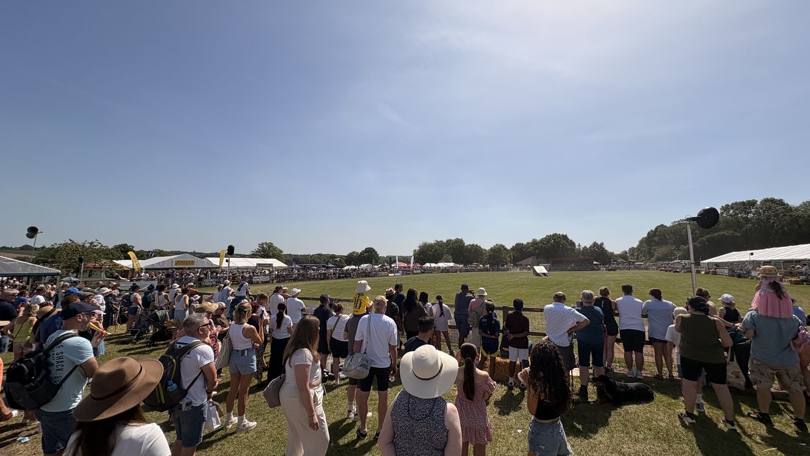 Crowds around the main ring on a hot day at the Hertfordshire County Show