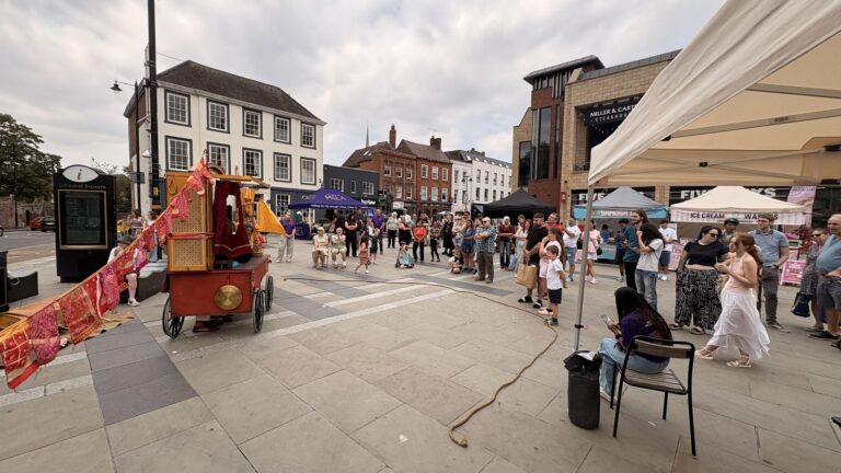 Stalls and visitors at the South Asian Food Festival in Worcester city centre